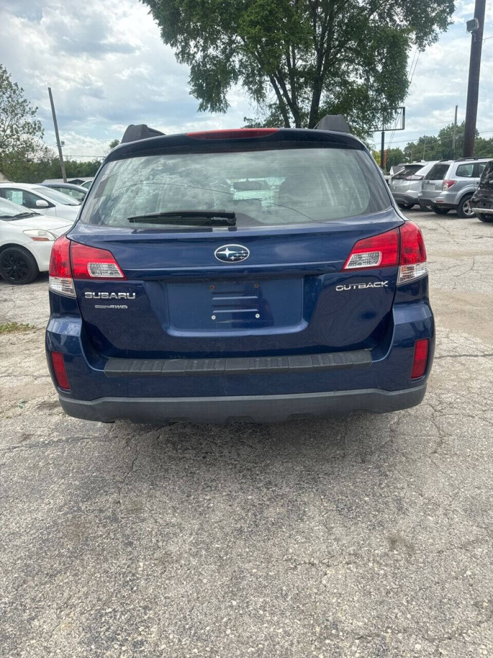 2011 Subaru Outback for sale at Calderon Auto Sales in Des Moines, IA