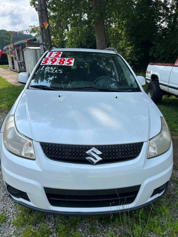 2012 Suzuki SX4 for sale at CHAMPION AUTO SALES in Brookville IN