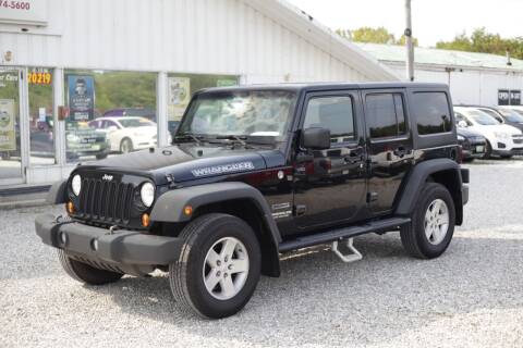 2011 Jeep Wrangler Unlimited for sale at Low Cost Cars in Circleville OH