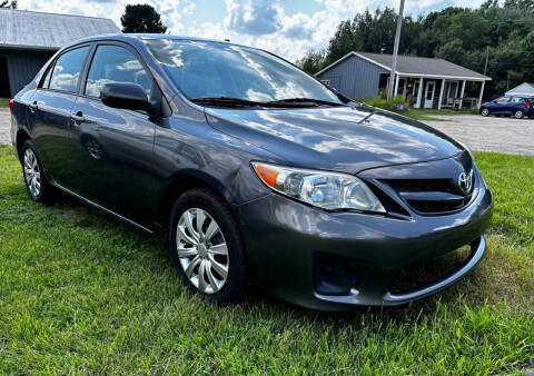 2012 Toyota Corolla for sale at Hammer Auto LLC in Stanwood MI