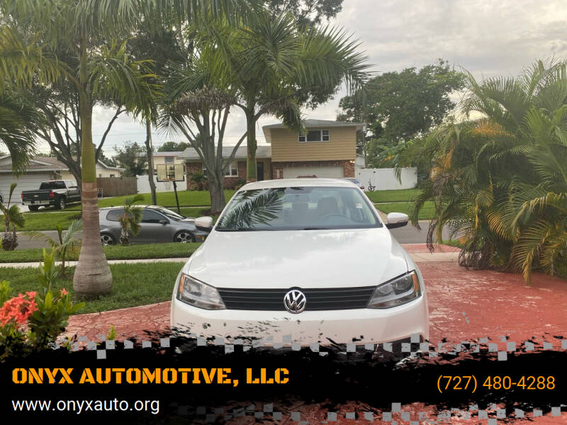 2013 Volkswagen Jetta for sale at ONYX AUTOMOTIVE, LLC in Largo FL