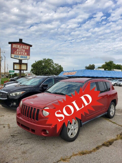 2010 Jeep Compass for sale at DURANGO AUTO CENTER LLC in Tulsa, OK