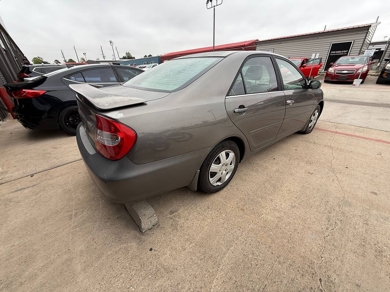 2004 Toyota Camry for sale at Chrome Auto in Houston, TX