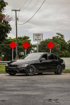 2013 BMW 3 Series for sale at CarMart of Broward in Lauderdale Lakes FL