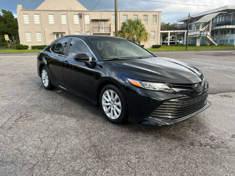 2019 Toyota Camry for sale at Tampa Trucks in Tampa FL
