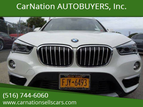2016 BMW X1 for sale at CarNation AUTOBUYERS Inc. in Rockville Centre NY