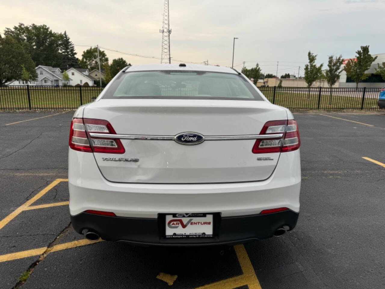 2014 Ford Taurus for sale at Carventure in Lansing, MI