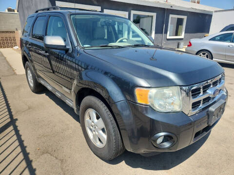 2008 Ford Escape for sale at COMMUNITY AUTO in Fresno CA