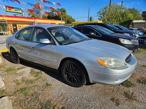 2003 Ford Taurus for sale at DAMM CARS in San Antonio TX