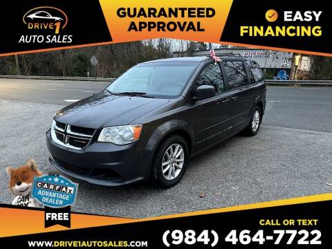 2015 Dodge Grand Caravan for sale at Drive 1 Auto Sales in Wake Forest NC