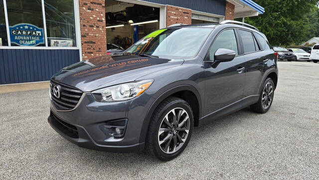 2016 Mazda CX-5 for sale at North Ridge Auto Center LLC in Madison, OH