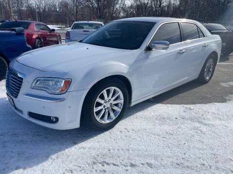 2013 Chrysler 300 for sale at Azteca Auto Sales LLC in Des Moines IA