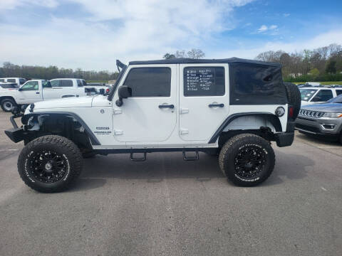 2012 Jeep Wrangler Unlimited for sale at A-1 AUTO AND TRUCK CENTER in Memphis TN
