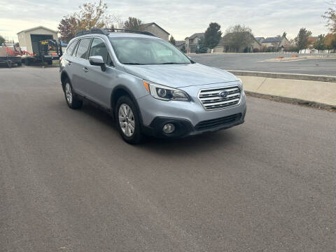2016 Subaru Outback for sale at The Car-Mart in Bountiful UT