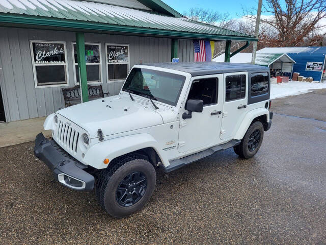 2015 Jeep Wrangler Unlimited for sale at Clarks Auto Sales Inc in Lakeview, MI