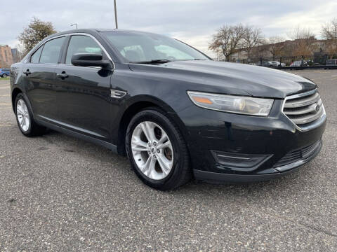 2014 Ford Taurus for sale at Angies Auto Sales LLC in Saint Paul MN