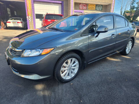 2012 Honda Civic for sale at CarMart One LLC in Freeport NY
