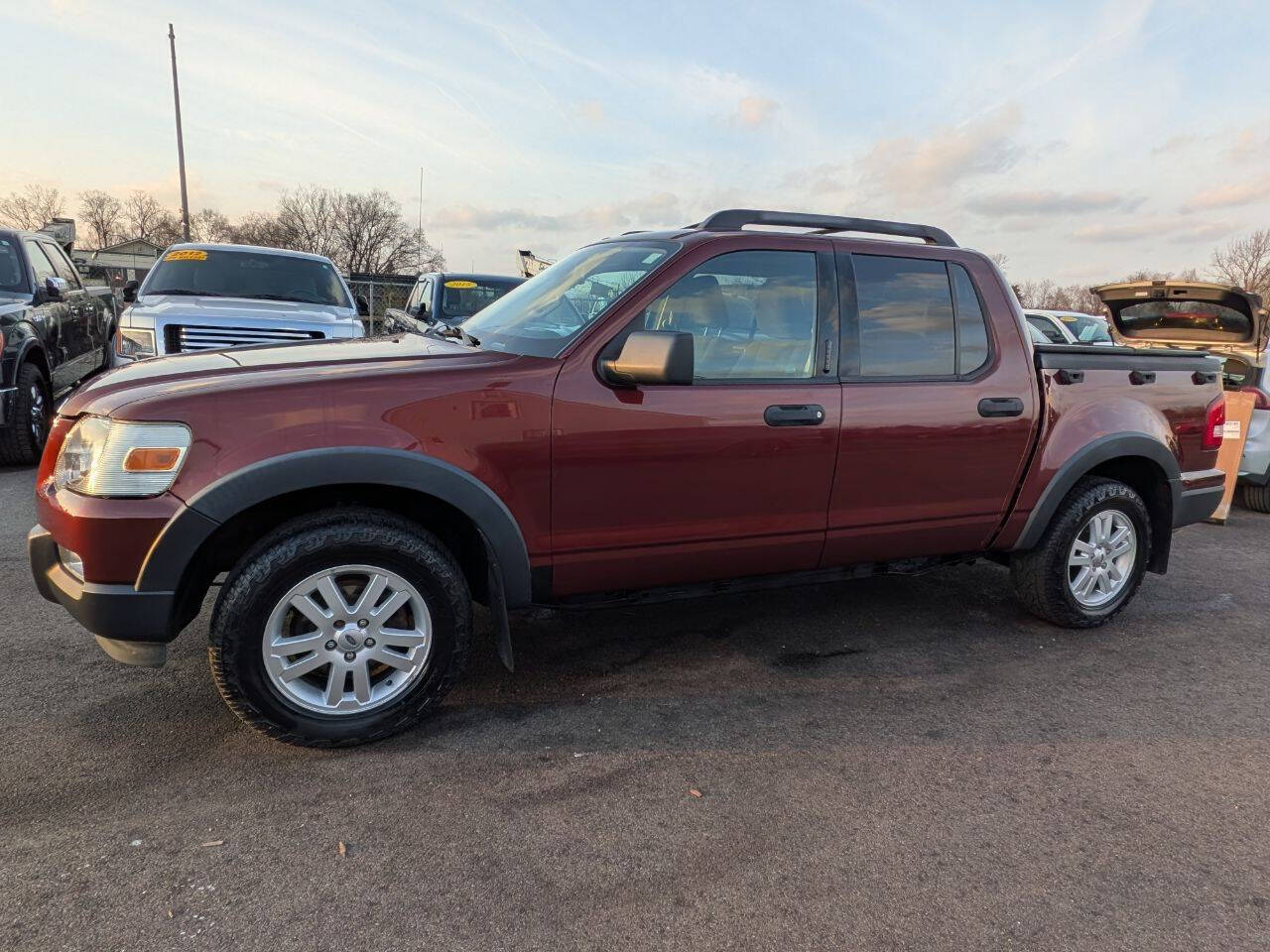 2010 Ford Explorer Sport Trac XLT 4x4 4dr Crew Cab's photo