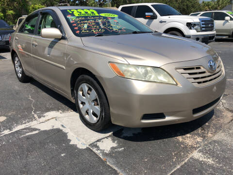 2009 Toyota Camry for sale at RIVERSIDE MOTORCARS INC - Main Lot in New Smyrna Beach FL