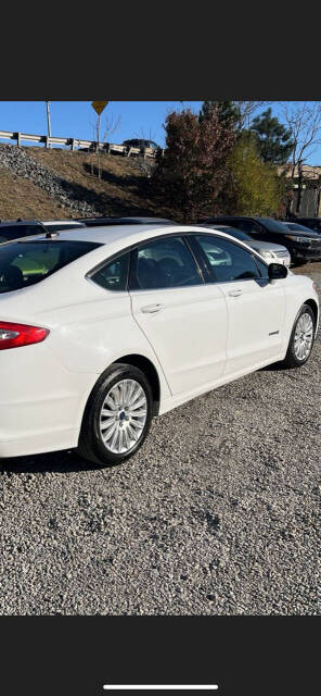 2013 Ford Fusion Hybrid for sale at Heavenly Touch Auto Sales Inc in Middletown, NY