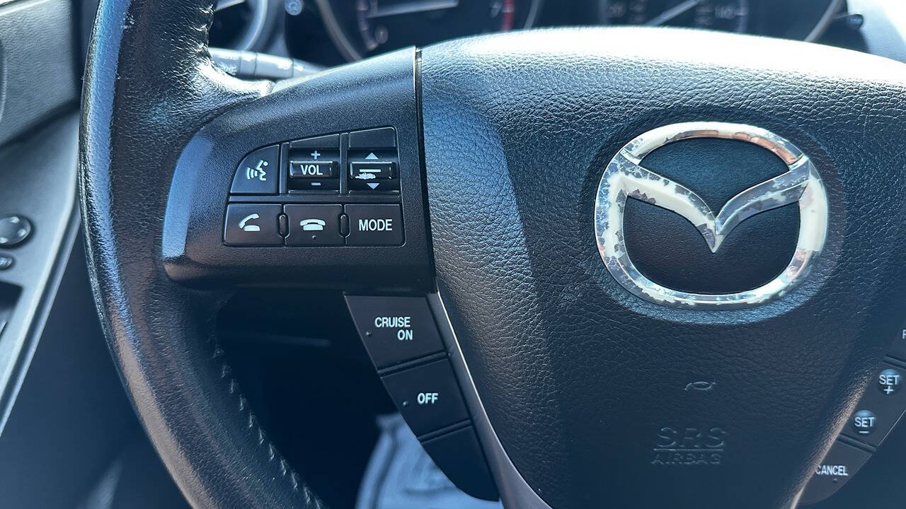 2012 Mazda Mazda3 for sale at North Ridge Auto Center LLC in Madison, OH