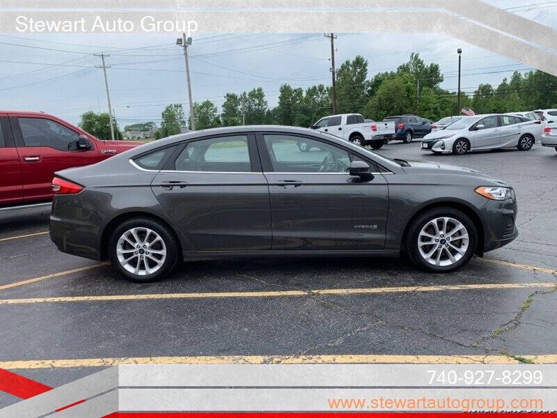 2019 Ford Fusion Hybrid for sale at Stewart Auto Group in Pataskala, OH