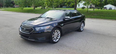 2014 Ford Taurus for sale at EXPRESS MOTORS in Grandview MO