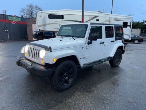 2015 Jeep Wrangler Unlimited for sale at Goodfella's  Motor Company in Tacoma WA
