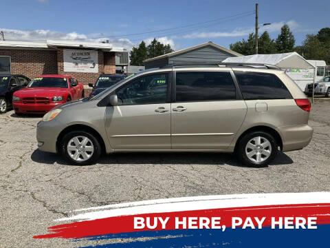 2005 Toyota Sienna for sale at Autocom, LLC in Clayton NC