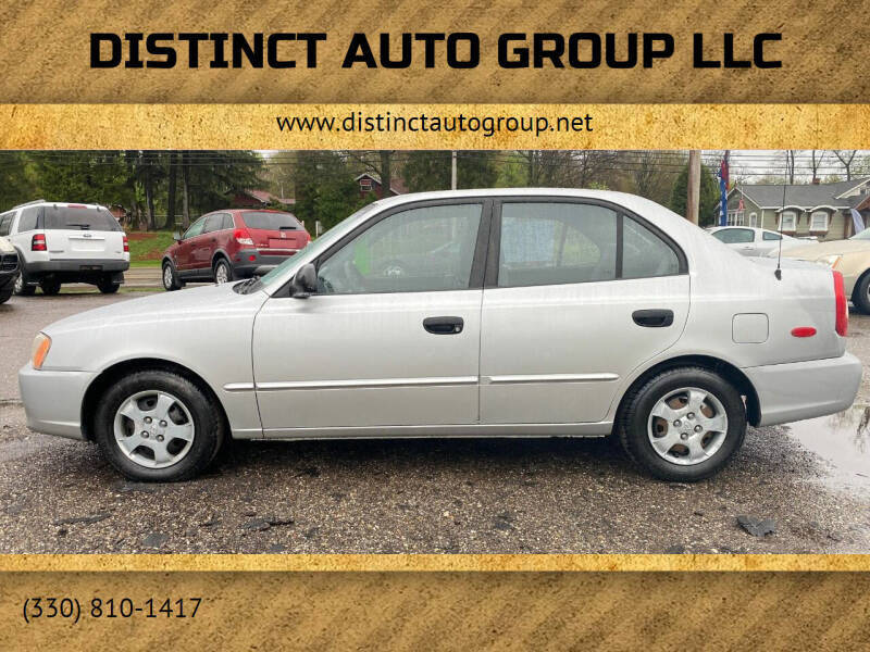 2002 Hyundai Accent for sale at DISTINCT AUTO GROUP LLC in Kent OH