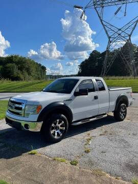 2013 Ford F-150 for sale at WIGGLES AUTO SALES INC in Mableton GA
