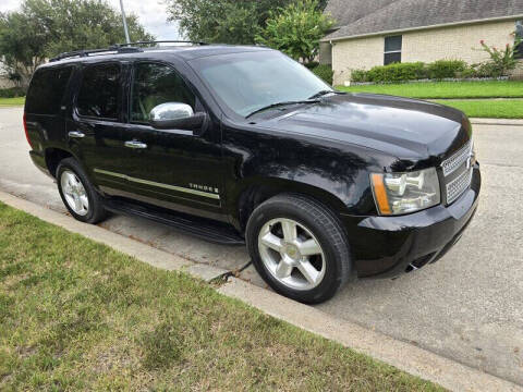 2009 Chevrolet Tahoe for sale at Essence Autos in Spring TX