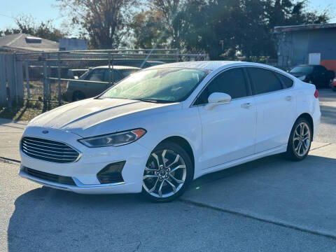 2019 Ford Fusion for sale at P J Auto Trading Inc in Orlando FL