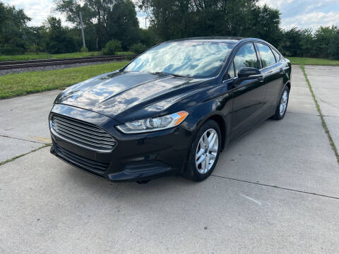 2014 Ford Fusion for sale at Mr. Auto in Hamilton OH