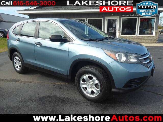 2014 Honda CR-V for sale at Lakeshore Autos in Holland, MI