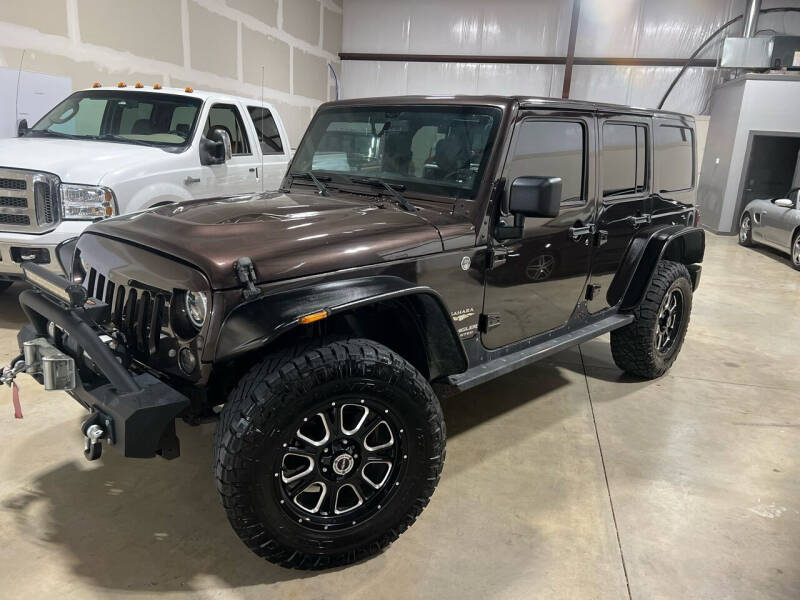 2013 Jeep Wrangler Unlimited for sale at Andover Auto Group, LLC. in Argyle TX