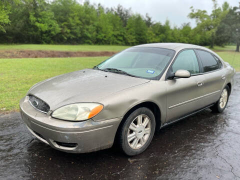 2005 Ford Taurus for sale at Russell Brothers Auto Sales in Tyler TX