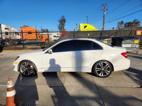 2013 Mercedes-Benz C-Class for sale at E and M Auto Sales in Bloomington CA