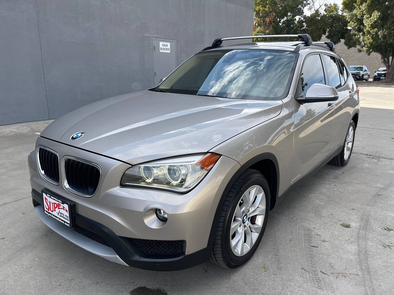 2014 BMW X1 for sale at Super Auto Sales Modesto in Modesto, CA