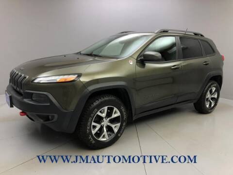 2014 Jeep Cherokee for sale at J & M Automotive in Naugatuck CT