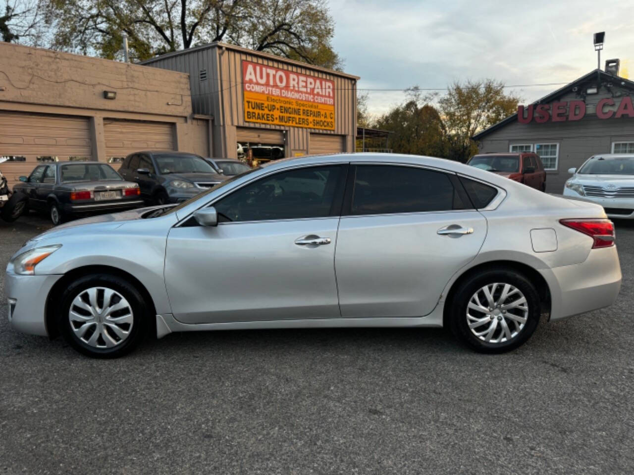 2015 Nissan Altima for sale at Walkem Autos in District Heights, MD