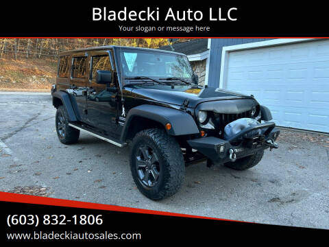 2014 Jeep Wrangler Unlimited for sale at Bladecki Auto LLC in Belmont NH
