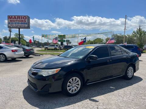 2014 Toyota Camry for sale at Mario Motors in South Houston TX