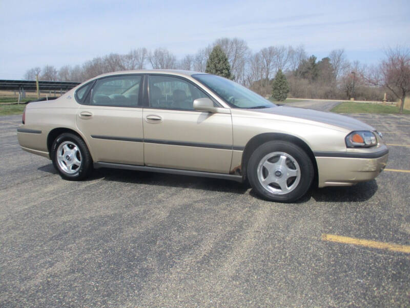 2004 Chevrolet Impala for sale at Crossroads Used Cars Inc. in Tremont IL