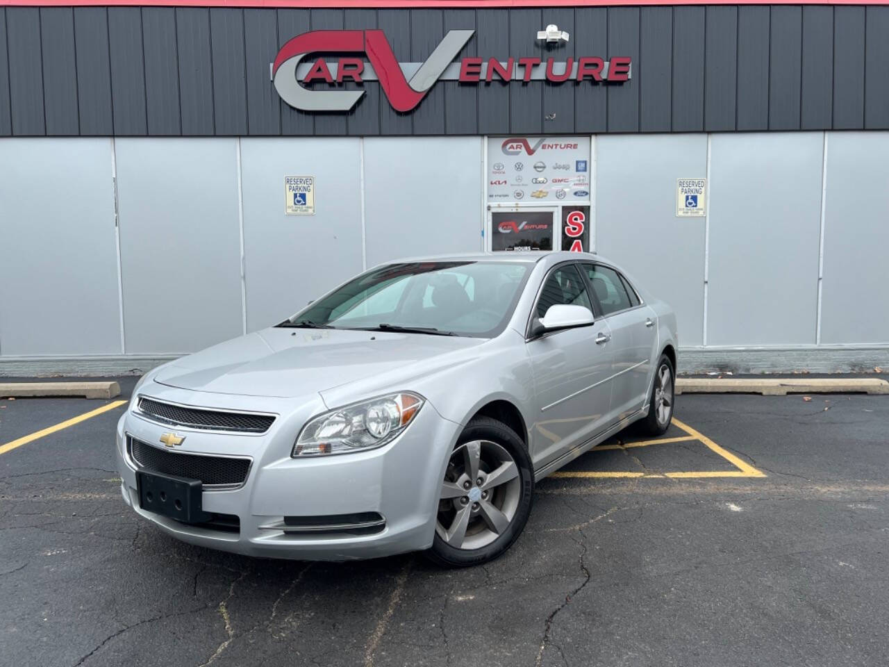 2012 Chevrolet Malibu for sale at Carventure in Lansing, MI