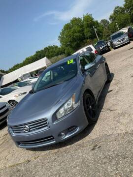2012 Nissan Maxima for sale at Autocom, LLC in Clayton NC