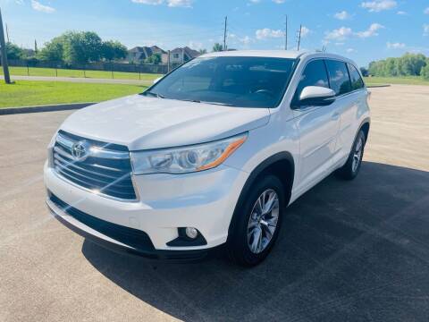 2014 Toyota Highlander for sale at AUTO DIRECT Bellaire in Houston TX