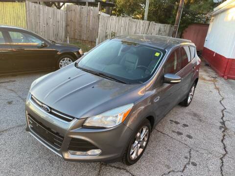 2013 Ford Escape for sale at THE CAR MANN in Stone Mountain GA