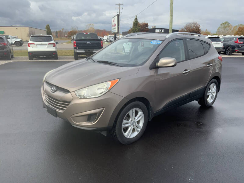 Used 2011 Hyundai Tucson GLS with VIN KM8JU3AC7BU173783 for sale in Traverse City, MI