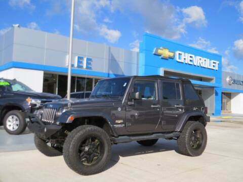 2014 Jeep Wrangler Unlimited for sale at LEE CHEVROLET PONTIAC BUICK in Washington NC